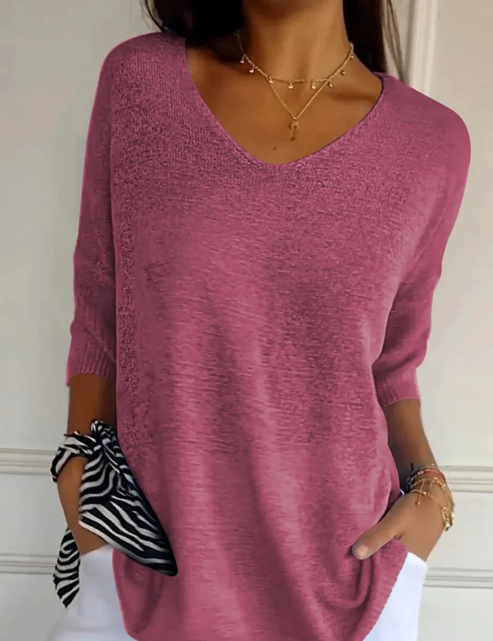 BLUSA LIGERA CON ESCOTE DE V