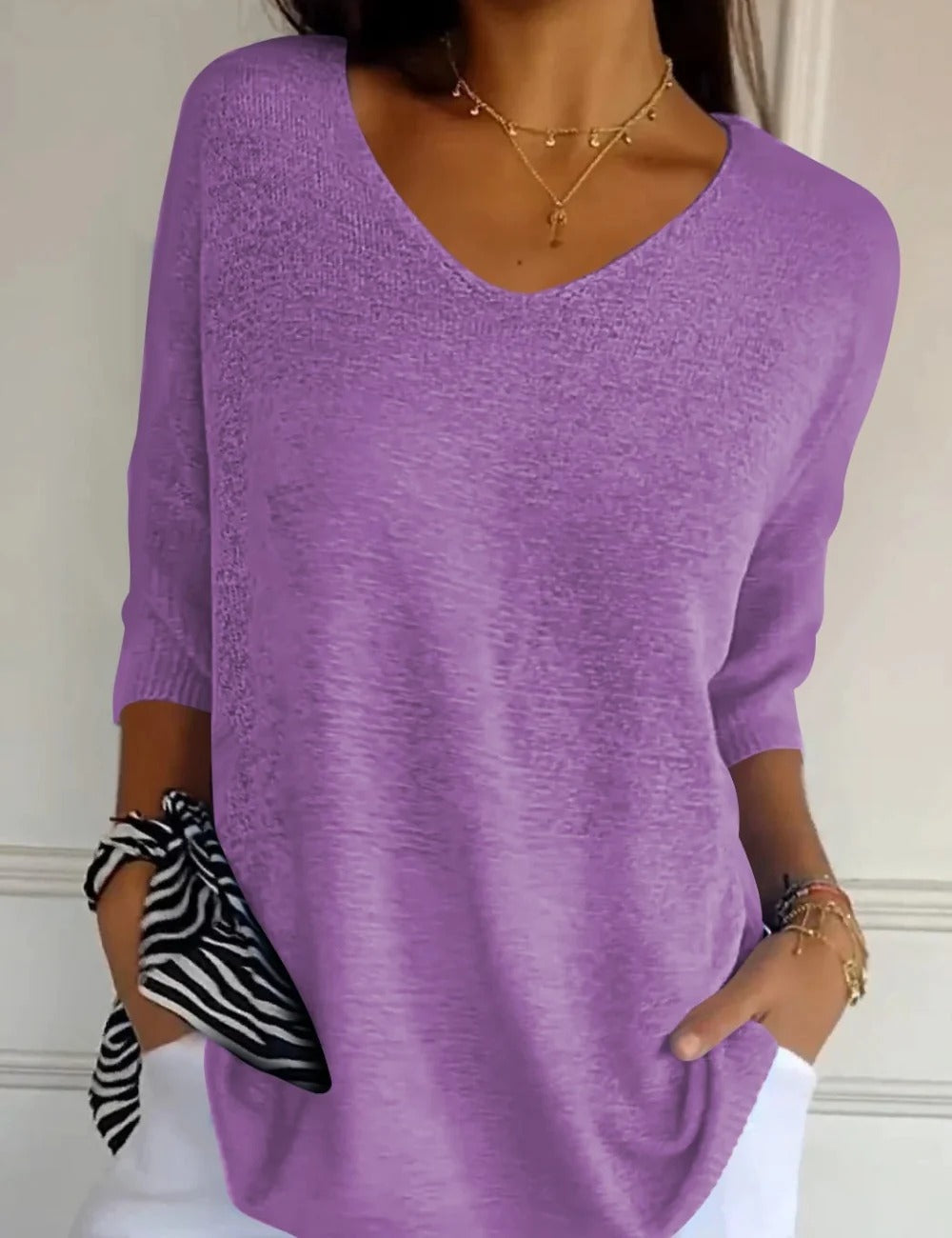 BLUSA LIGERA CON ESCOTE DE V